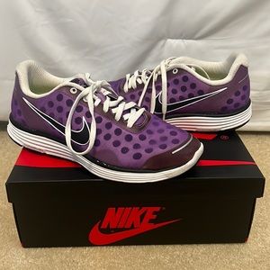 Size 8 women’s, purple polka dot, running shoes, only worn a few times.